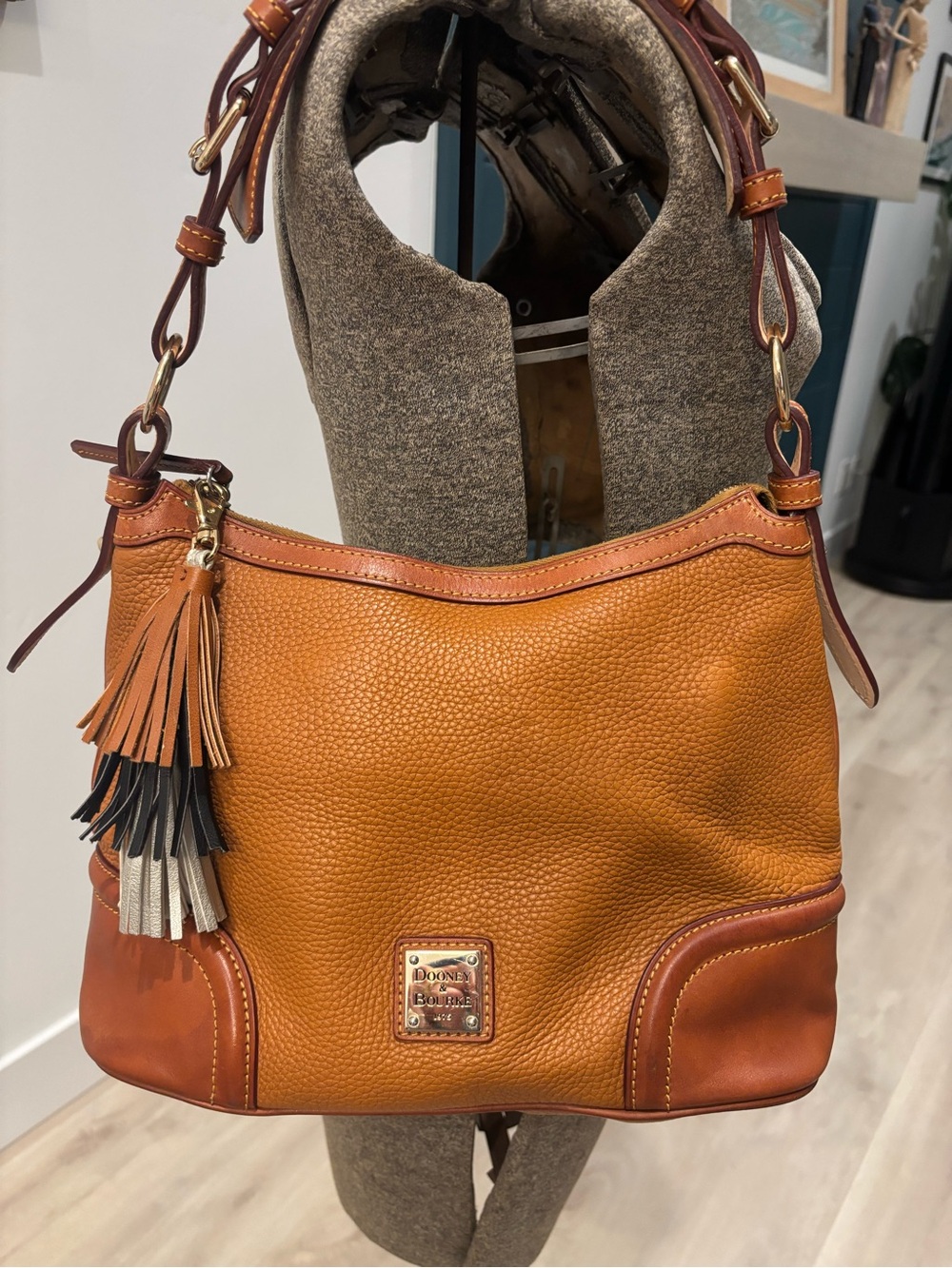 Dooney & Bourke Cognac/Tan Pebbled Leather Hobo with Tassel